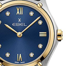 Eine bicolorfarbene Uhr mit dunkelblauem Ziffernblatt von Ebel.